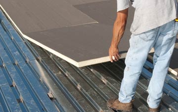 benefits of insulating St Giles On The Heath flat roofing